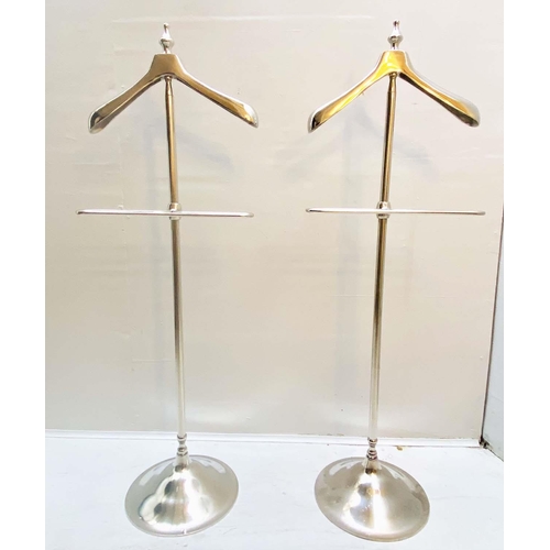 399 - VALET STANDS, a pair, polished metal, 140cm x 41cm x 37cm.