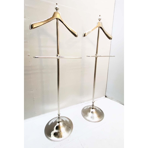 399 - VALET STANDS, a pair, polished metal, 140cm x 41cm x 37cm.