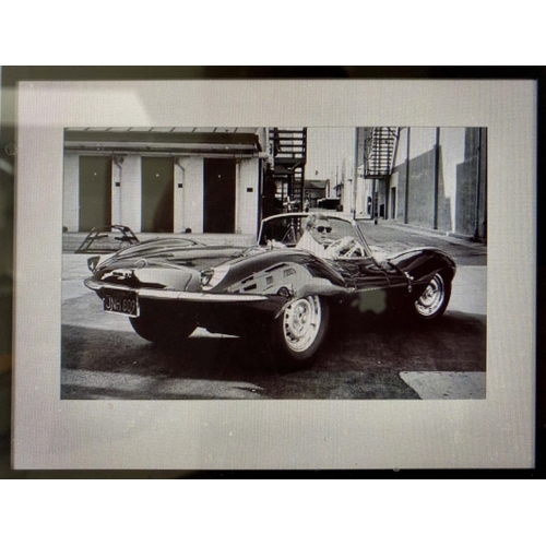 413 - 'STEVE MCQUEEN IN HIS JAGUAR', photographic print, framed and glazed, 63cm x 83cm.