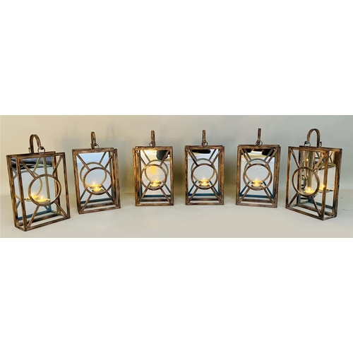 415 - WALL HANGING CANDLE LANTERNS, a set of six, Art Deco style, mirrored backs, 43cm x 22cm x 11cm. (6)