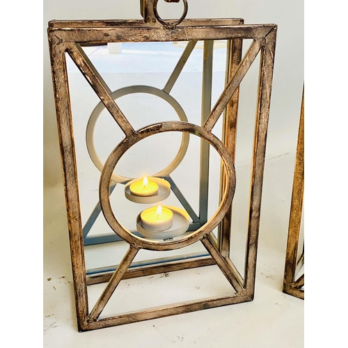 415 - WALL HANGING CANDLE LANTERNS, a set of six, Art Deco style, mirrored backs, 43cm x 22cm x 11cm. (6)