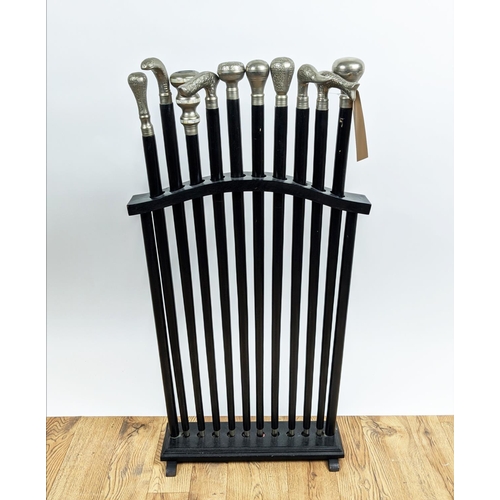 480 - WALKING STICKS, a collection set of ten, various handles, in stand, 51cm x 18cm x 98cm. (10)