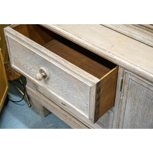 485 - BOOKCASE, 205cm H x 227cm W x 53cm D circa 1930, Danish limed oak with two glazed doors and carved p... 