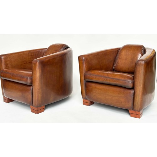 138 - AVIATOR ARMCHAIRS, a pair, mid 20th century brown natural soft tan leather with converging backs and... 