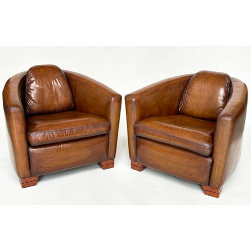 138 - AVIATOR ARMCHAIRS, a pair, mid 20th century brown natural soft tan leather with converging backs and... 