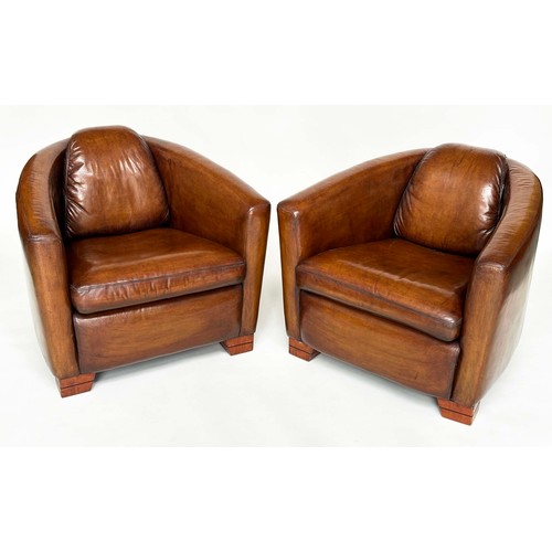 138 - AVIATOR ARMCHAIRS, a pair, mid 20th century brown natural soft tan leather with converging backs and... 