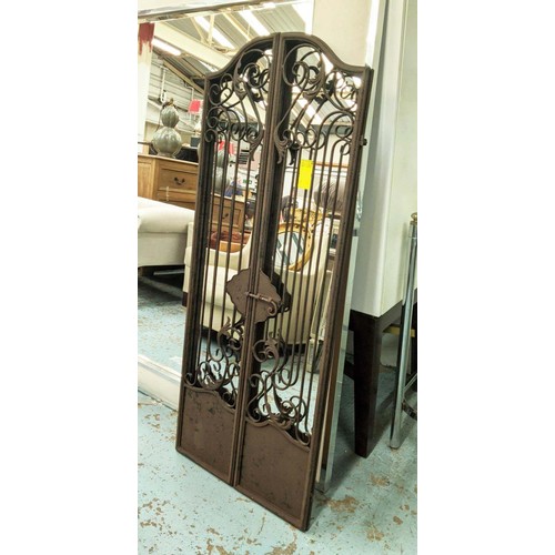 472 - GARDEN WALL MIRRORS, a pair, of gated design,  aged finish, 127cm H x 52cm W. (2)