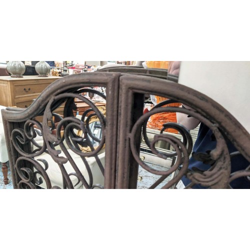 472 - GARDEN WALL MIRRORS, a pair, of gated design,  aged finish, 127cm H x 52cm W. (2)