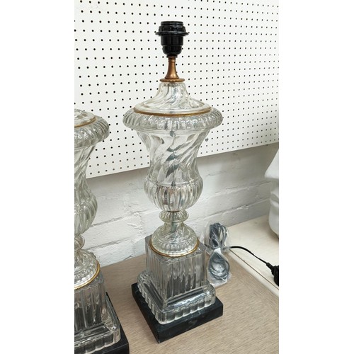 509 - TABLE LAMPS, 58cm H, a pair, in the classical style, glass, black marble bases.