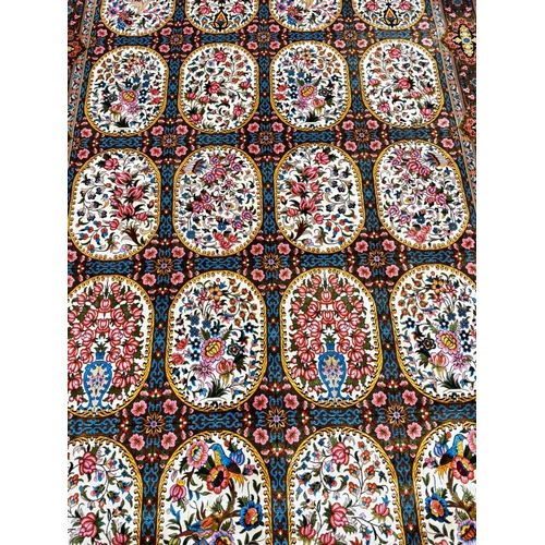 93 - FINE QUM DESIGN RUG, 225cm x 146cm.