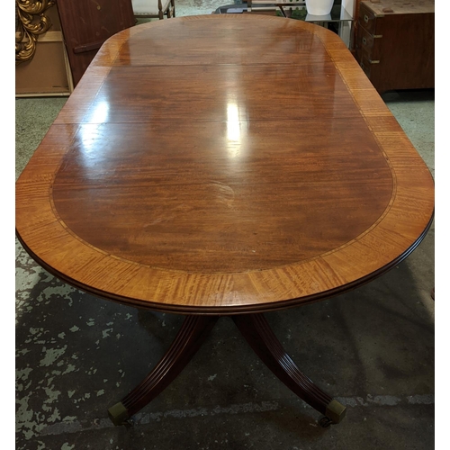 382 - DINING TABLE, Regency style mahogany with crossbanded detail, with two extra leaves on twin quadrafo... 