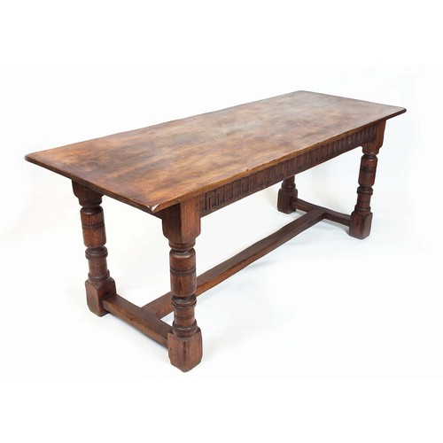 179 - ELIZABETHAN STYLE OAK REFECTORY DINING TABLE, 75cm H x 183cm W x 71cm D.