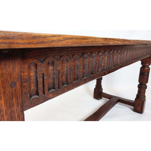 179 - ELIZABETHAN STYLE OAK REFECTORY DINING TABLE, 75cm H x 183cm W x 71cm D.