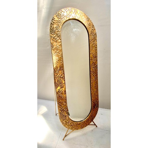 326 - DRESSING MIRROR, 156cm high, 57cm wide, 48cm deep, free standing, gilt metal, foliate embossed surro... 