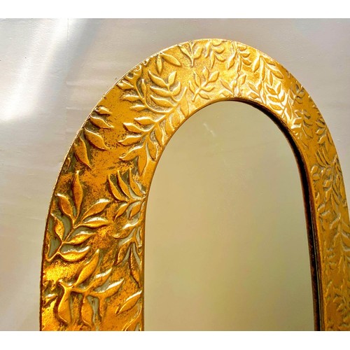 326 - DRESSING MIRROR, 156cm high, 57cm wide, 48cm deep, free standing, gilt metal, foliate embossed surro... 