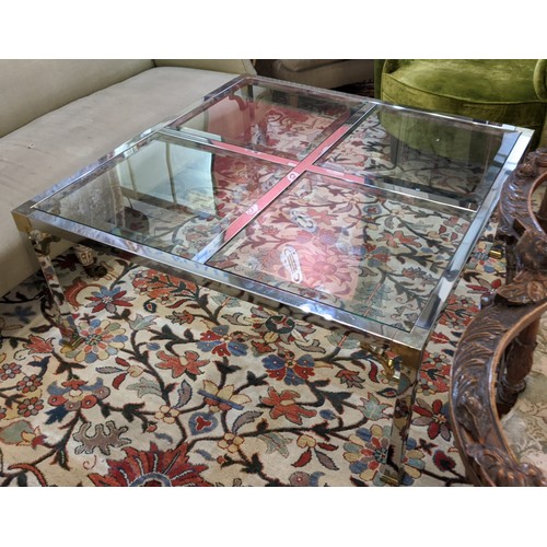 338 - LOW TABLE, four glass panels to top, chrome frame, brass corners and feet, square sectioned, 50cm H ... 