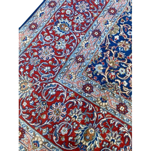 99 - ANTIQUE PERSIAN KERMAN LAVER CARPET, 407cm x 304cm.