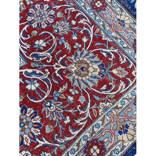 99 - ANTIQUE PERSIAN KERMAN LAVER CARPET, 407cm x 304cm.