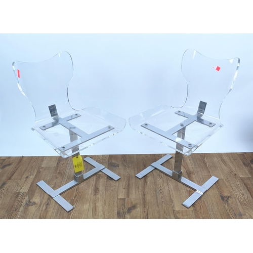 434 - SIDE CHAIRS, a pair, lucite and chrome, each 51cm x 89cm H. (2)