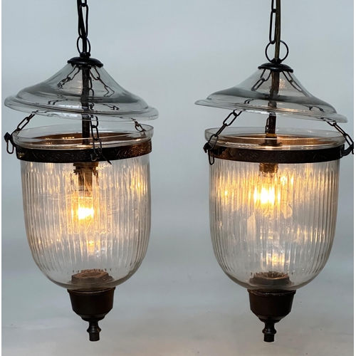 653 - BELL JAR HALL LANTERNS, a pair, glass reeded tapering and bronze style mounted, 58cm H x 34cm W. (2)