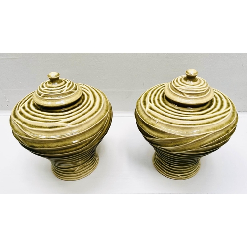 468 - LIDDED RIPPLE VASES, pair, 35cm high, 30cm diameter, glazed ceramic. (2)