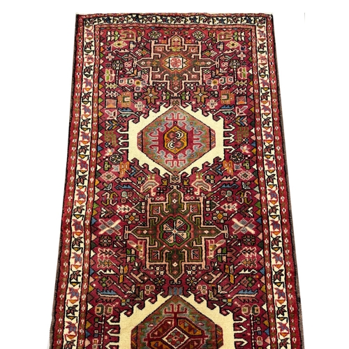 102 - PERSIAN KARAJA LONG RUNNER, 337cm x 85cm.