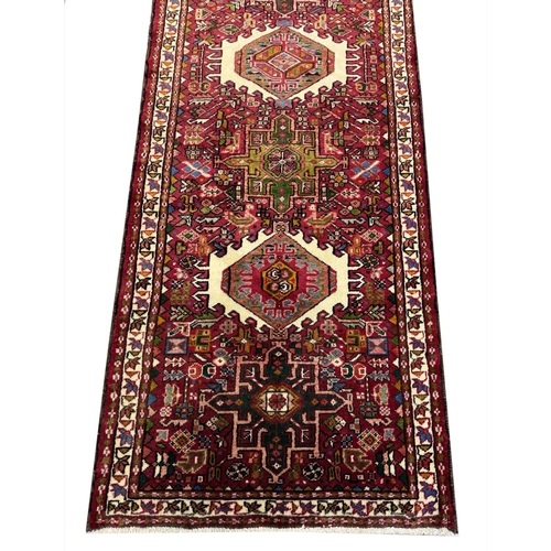 102 - PERSIAN KARAJA LONG RUNNER, 337cm x 85cm.