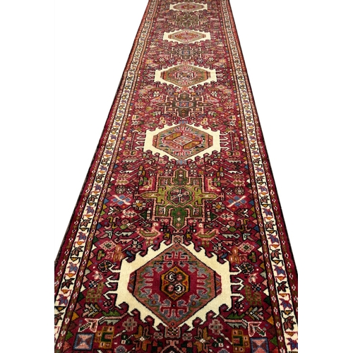 102 - PERSIAN KARAJA LONG RUNNER, 337cm x 85cm.