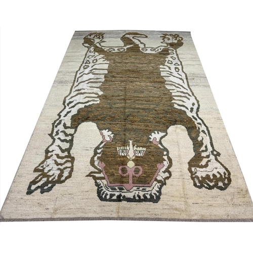 106 - TIBETAN TIGER CARPET, 302cm x 211cm.