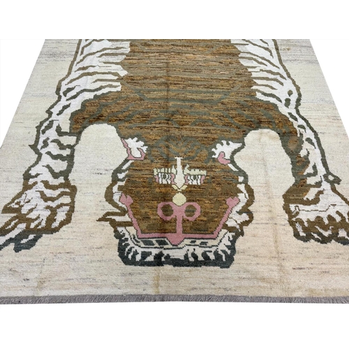 106 - TIBETAN TIGER CARPET, 302cm x 211cm.