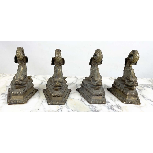 17 - BOOKENDS, four, Regency style bronze dolphins, 20cm H x 12cm W x 12cm L. (4)