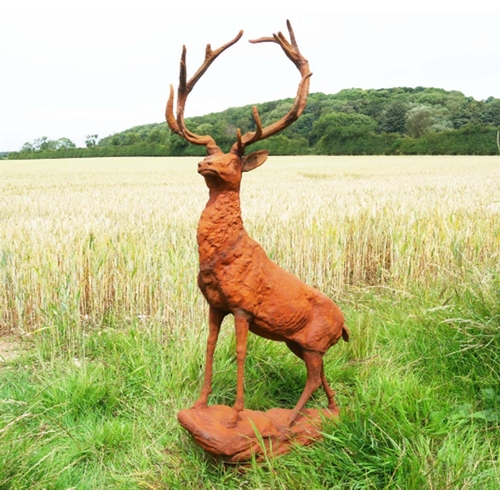 341 - SCULPTURAL STAG,160cm high, 88cm long, 55cm deep, cast metal, oxidised finish.