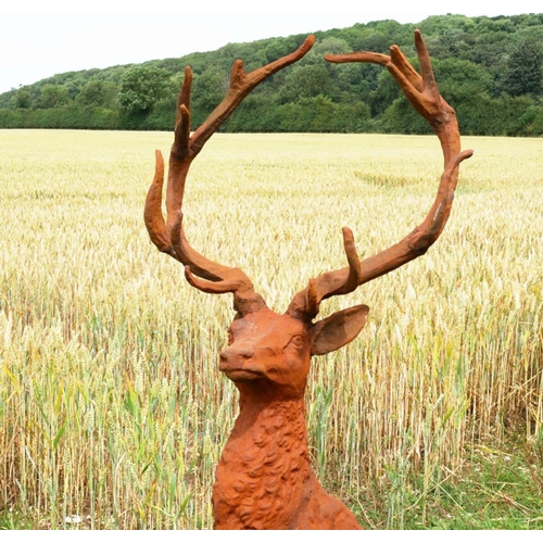 341 - SCULPTURAL STAG,160cm high, 88cm long, 55cm deep, cast metal, oxidised finish.