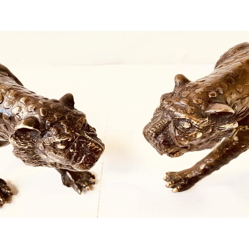 349 - BRONZE LEOPARD FIGURES, a pair, 14cm x 50cm x 10cm (2)