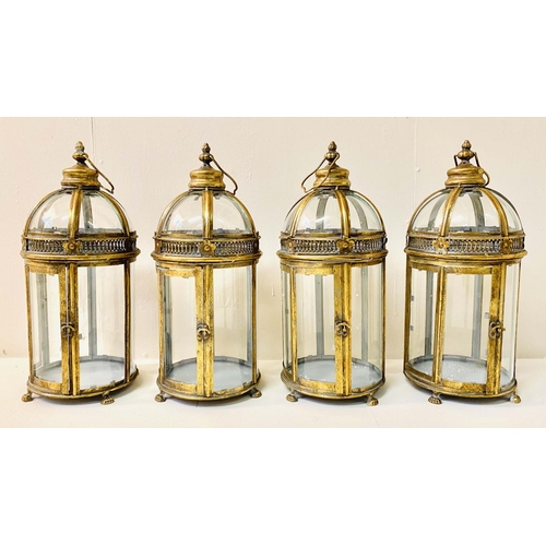 350 - STORM LANTERNS, a set of four, Regency style, gilt metal, 46cm H x 19cm diam. (4)