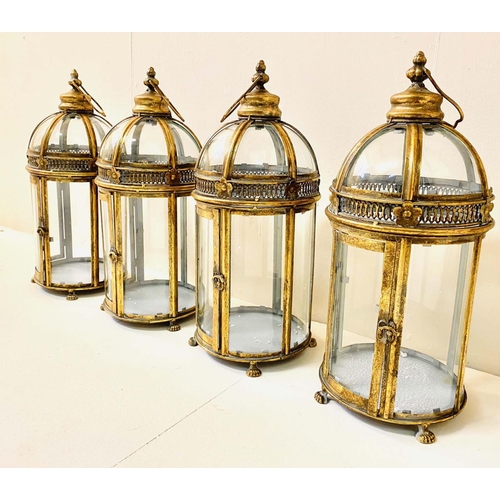 350 - STORM LANTERNS, a set of four, Regency style, gilt metal, 46cm H x 19cm diam. (4)