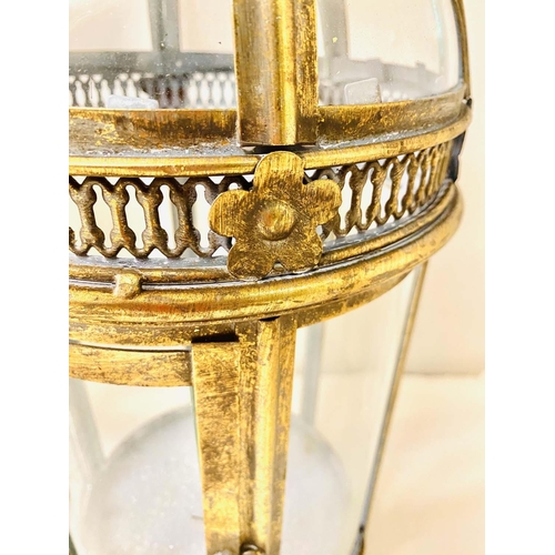 350 - STORM LANTERNS, a set of four, Regency style, gilt metal, 46cm H x 19cm diam. (4)