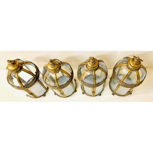 350 - STORM LANTERNS, a set of four, Regency style, gilt metal, 46cm H x 19cm diam. (4)