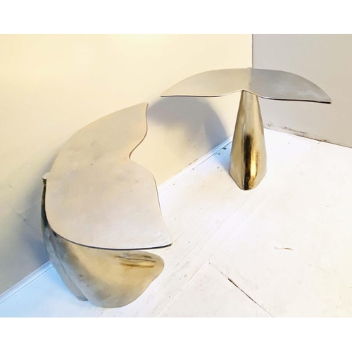 353 - SIDE TABLES, 55cm high, 54cm wide, 44cm deep, pair, in the form of Whale tails, polished metal. (2)