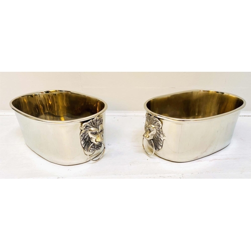 355 - CHAMPAGNE COOLERS, a pair, 16cm high, 45cm wide, 26cm deep, lion head ring handles, polish metal. (2... 