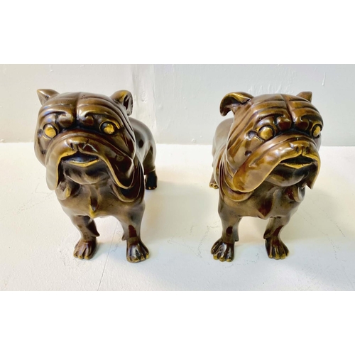 357 - BRONZE BULL DOGS, a pair, 23cm x 31cm x 11cm (2)