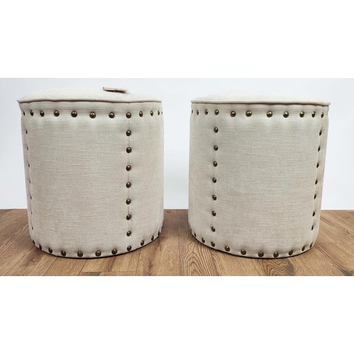 367 - STOOLS, a pair, cylindrical in neutral upholstery with stud detail, each 48c, H x 46cm D. (2)