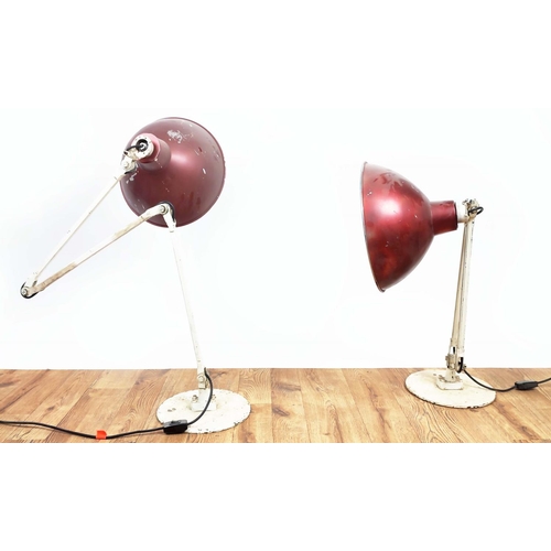 382 - INDUSTRIAL STYLE LAMPS, a pair, mid 20th century metal with red shades, adjustable, shades each 34cm... 