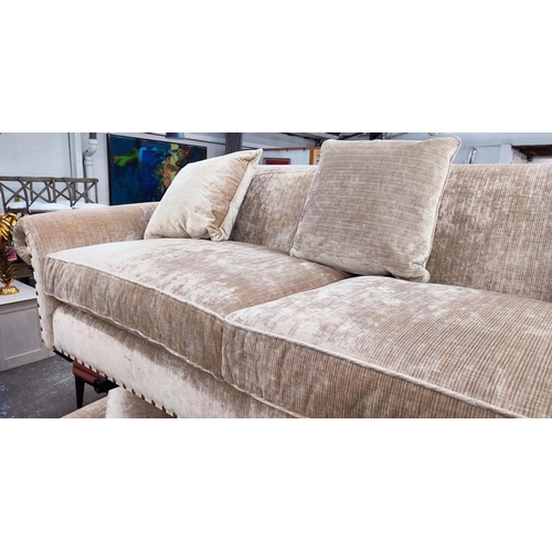 384 - SOFA , sand coloured fabric upholstery, gilt metal studded detail, 235cm W approx.