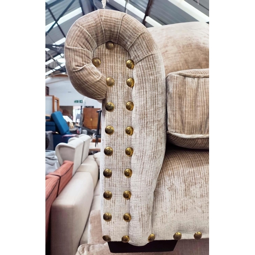 384 - SOFA , sand coloured fabric upholstery, gilt metal studded detail, 235cm W approx.