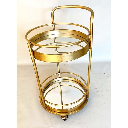 398 - COCKTAIL TROLLEY, 77cm high, 42cm diameter, 1960s French style, mirrored glass tiers, gilt metal fra... 