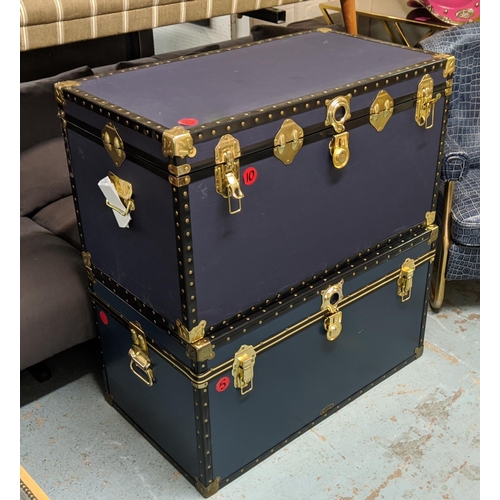 461 - TRUNKS, two, with rising lids, brass details, in differing shades of blue, each approx 50cm x 92cm x... 