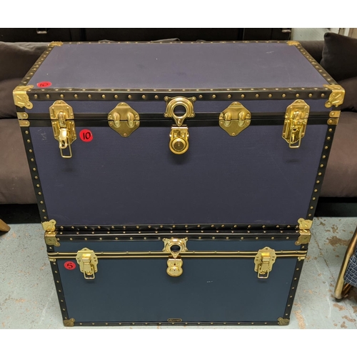 461 - TRUNKS, two, with rising lids, brass details, in differing shades of blue, each approx 50cm x 92cm x... 