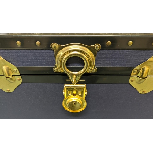 461 - TRUNKS, two, with rising lids, brass details, in differing shades of blue, each approx 50cm x 92cm x... 