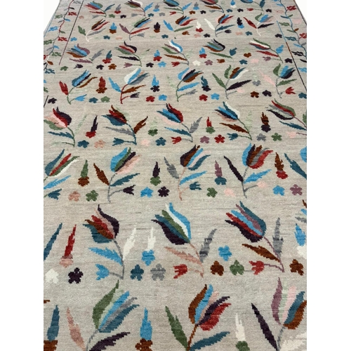 81 - FINE SUZANI TULIP DESIGN CARPET, 309cm x 203cm.